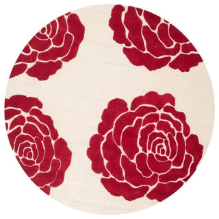 Safavieh Cambridge 6' Round Hand Tufted Wool Rug in Ivory and Red