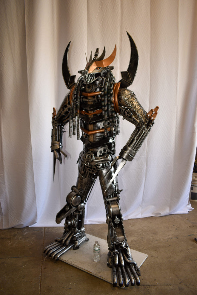 Colorfull impresive Statue of a warrier made of metal scraps 48" x 20" x 82"H