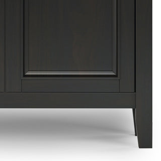 Close-up of bottom front panel on white background.