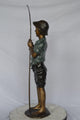 Boy with fishing rod  bronze statue -  Size: 11"L x 14"W x 44"H.