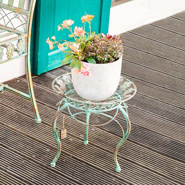 13" Round Metal Plant Stand with Peacock Tail Motif and Curved Legs