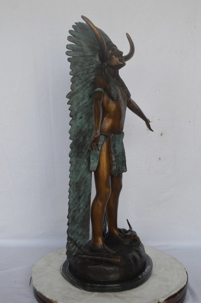Indian with Plume bronze statue - Size: 22"L x 14"W x 38"H.