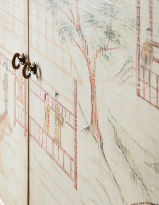 Close-up on white background highlighting door handles and front detail.