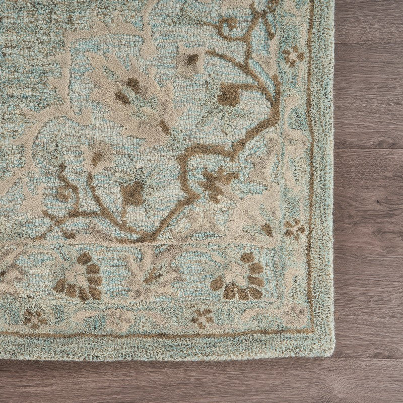 9" x 12" Blue and Beige Flor Medallion Area Rug