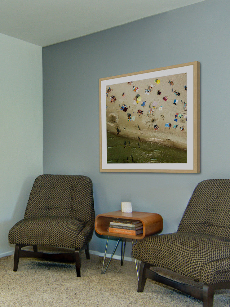 "Beach Goers" Framed Print by Karolis Janulis