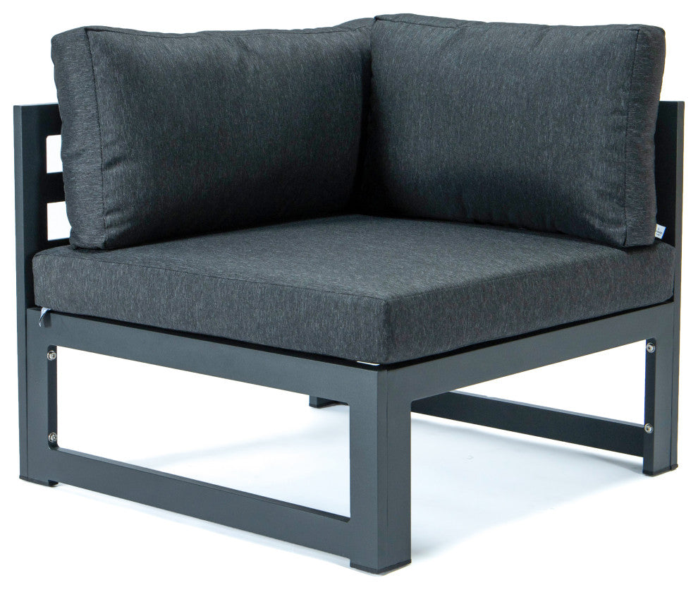 LeisureMod Chelsea 7-Piece Patio Ottoman Sectional With Coffee Table, Black