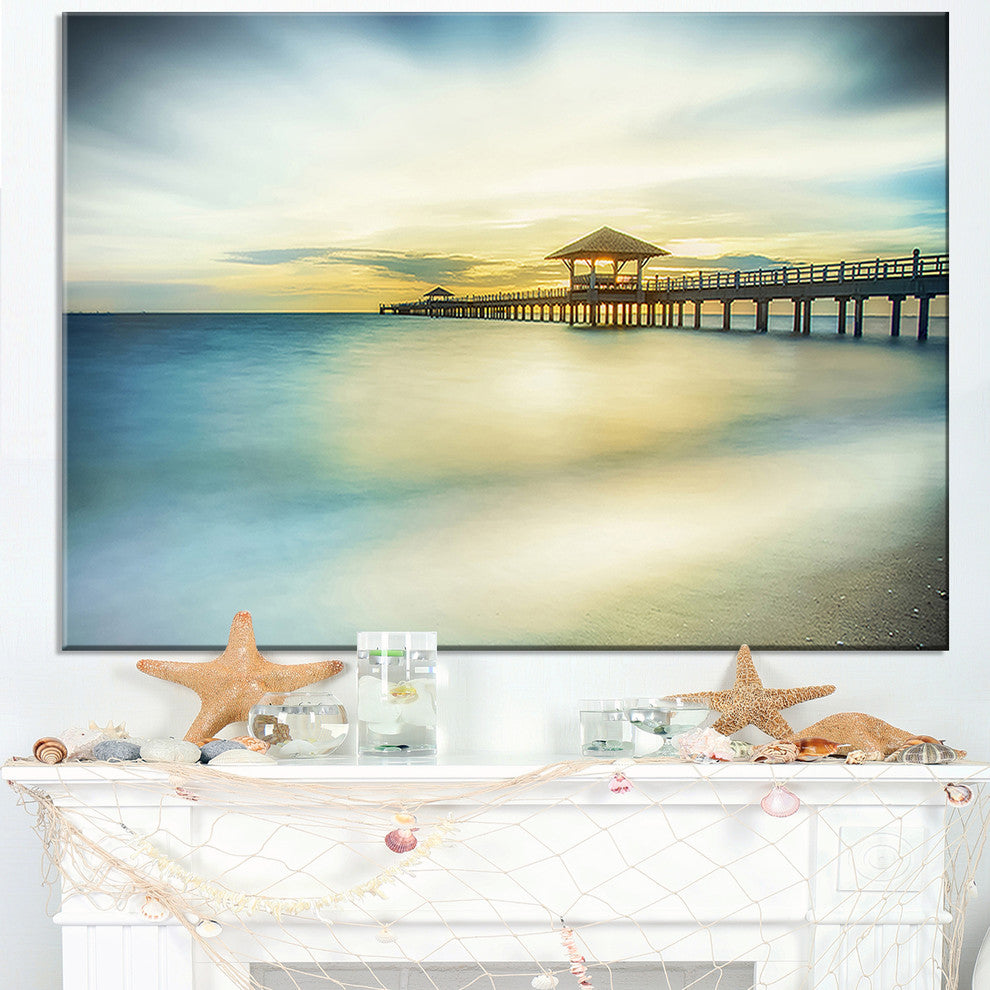 "Blue Tinged Seashore With Distant Pier" Sea Pier Wall Art Canvas Print, 40"x20"