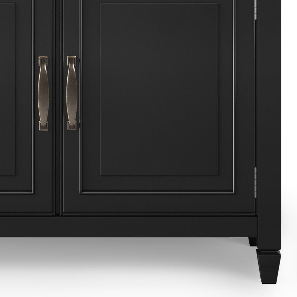 Close-up of cabinet door with handles; white background.