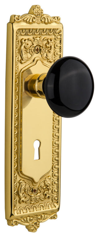 Egg & Dart Plate Privacy Black Porcelain Knob, Polished Brass