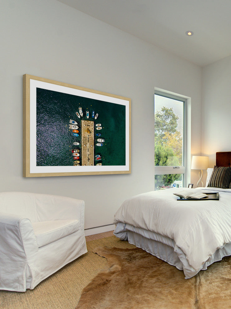 "Boats Docked" Framed Print by Karolis Janulis