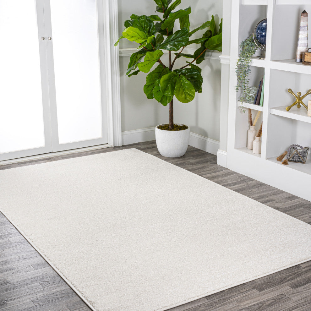Haze Solid Low-Pile Cream 6 ft. x 9 ft. Area Rug