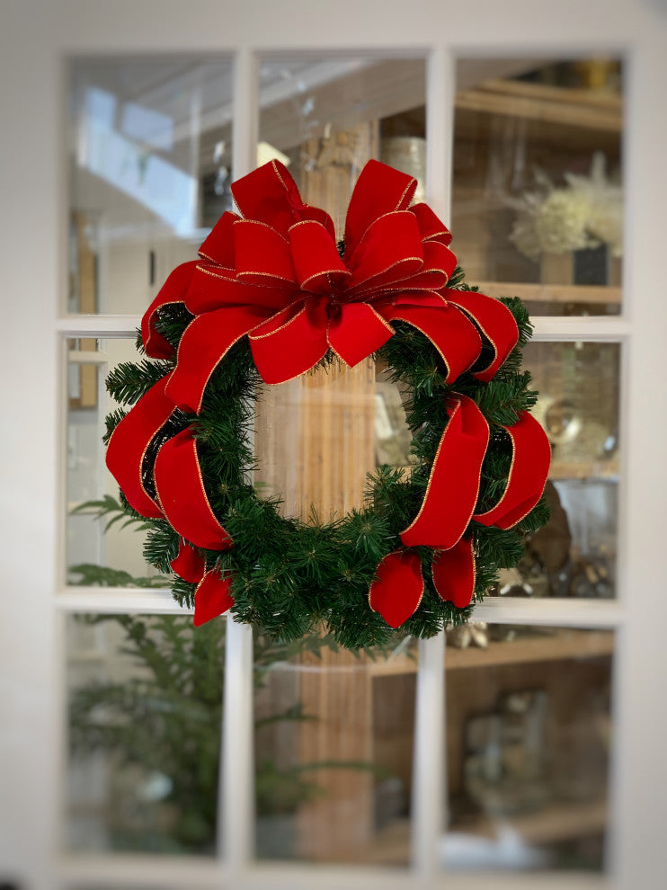 22" Wreath With A Red Bow.