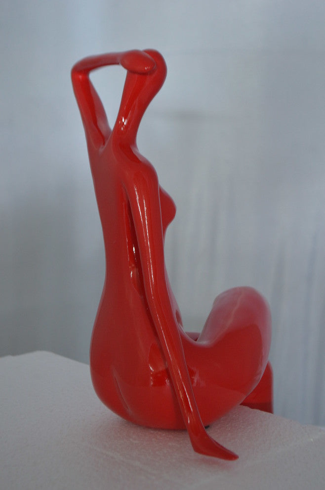 Modern Art Sitting on Edge Girl Made of Resin -  Size: 9"L x 7"W x 16"H.