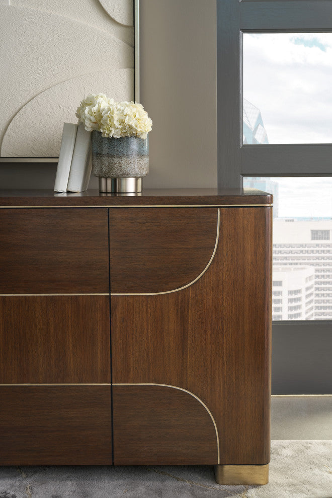 Lifestyle shot showing the credenza in a real-room setting with decor.