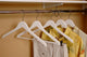 White Rubberized Wooden Suit Hanger With Bar, Box of 50