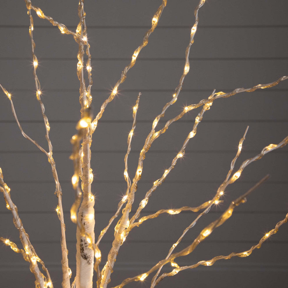 Another close-up of LED branches on dark background, no environment.