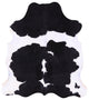 7' 0" X 6' 5" Black and White Natural Cowhide Rug C2424