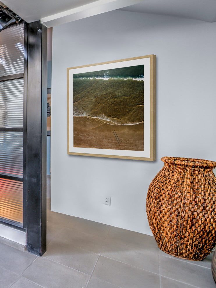 "Walking The Shore" Framed Print by Karolis Janulis