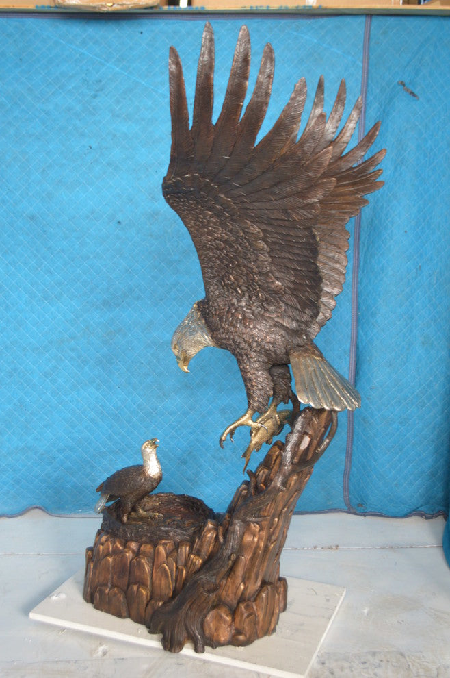 Eagle with nest Bronze Statue -  Size: 36"L x 40"W x 63"H.