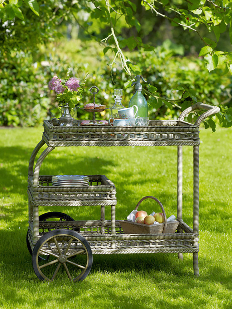 Full trolley on a lawn in a garden setting; product clearly visible.