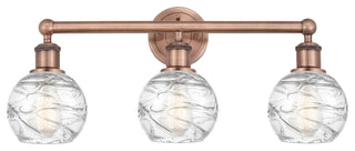 Athens Deco Swirl 3-Light 24" Bath Vanity Light, Antique Copper, Clear