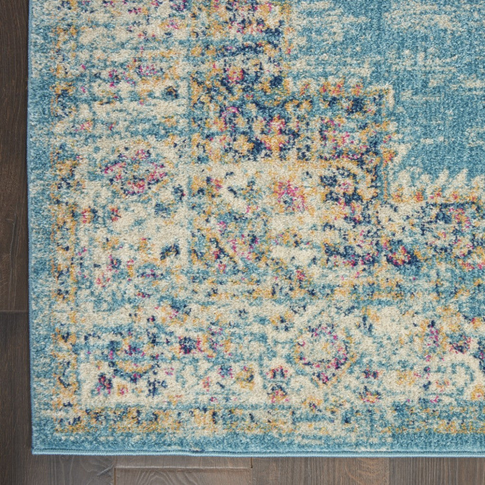 7' X 10' Blue and Ivory Medallion Power Loom Distressed Area Rug