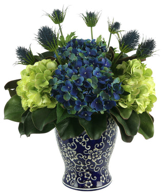 Assorted Hydrangea and Thistle Arrangement in a Decorative Ceramic Vase