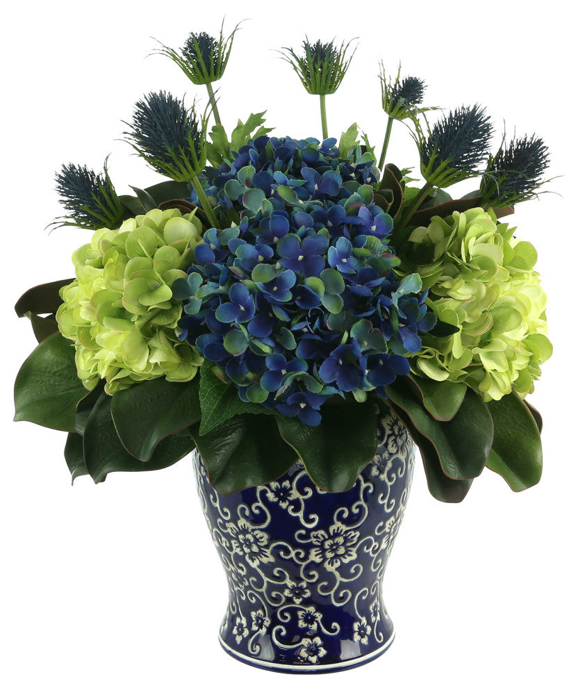 Assorted Hydrangea and Thistle Arrangement in a Decorative Ceramic Vase