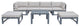LeisureMod Chelsea 7-Piece Patio Ottoman Sectional With Coffee Table, Beige
