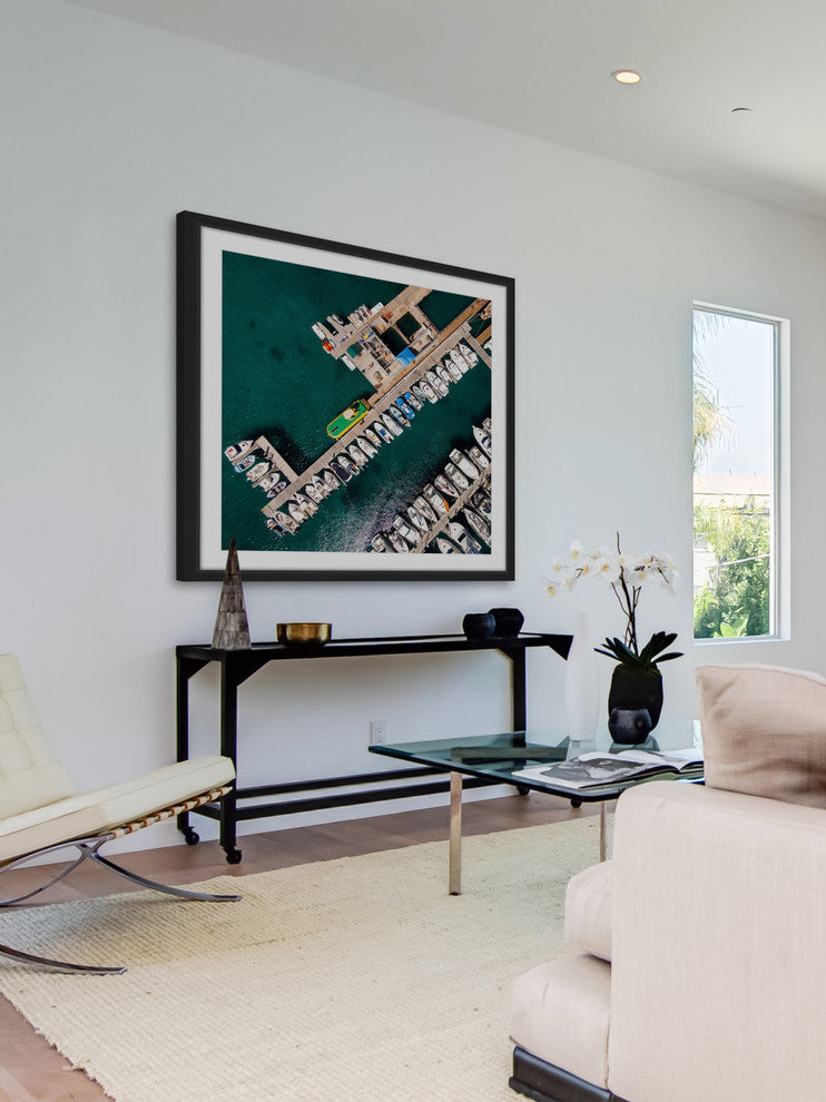 "Neatly Docked Boats" Framed Print by Karolis Janulis