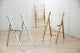 LeisureMod Menno Acrylic Folding Chair With Stainless Steel Frame, Brushed Gold