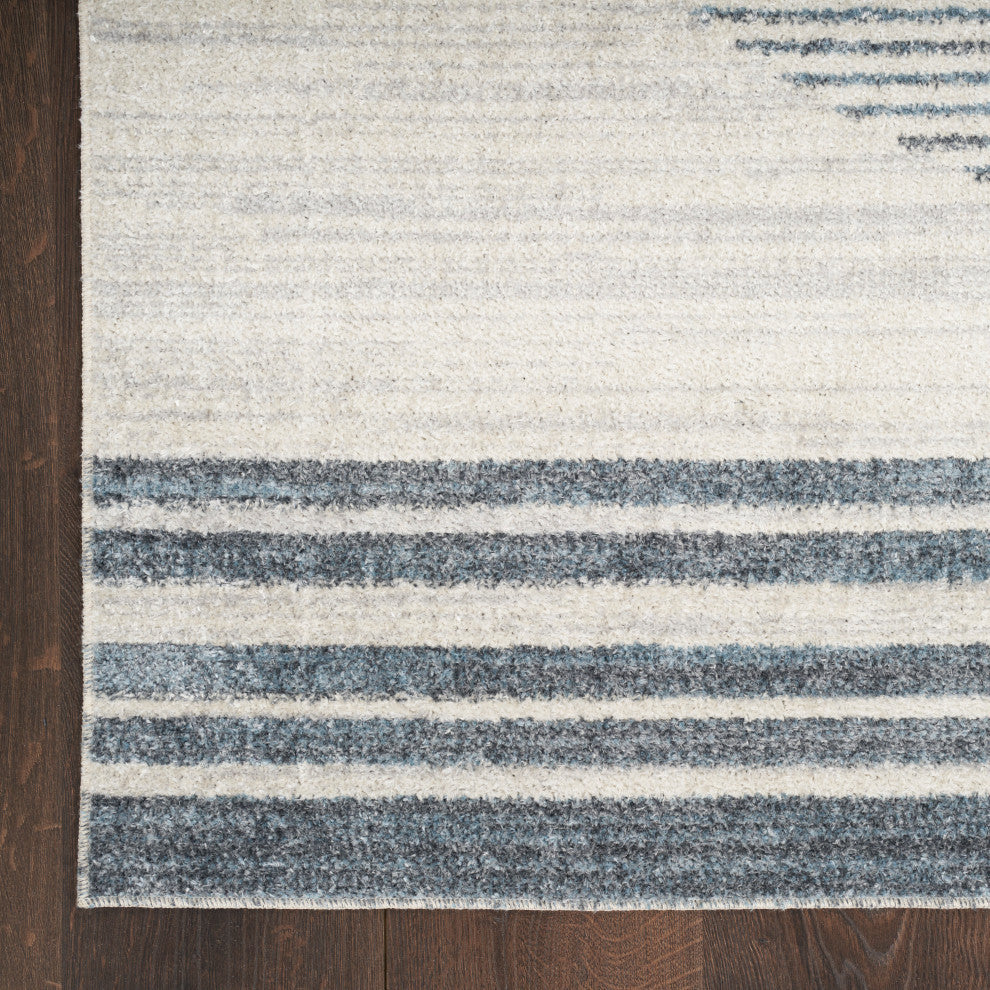 Nourison Astra Machine Washable 7' x 9' Ivory Blue   Area Rug