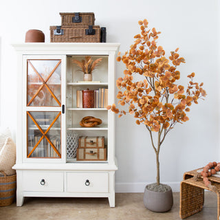 Lifestyle scene showing the tree in a room with furniture.