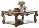 58" Gold Solid And Manufactured Wood Coffee Table With Shelf