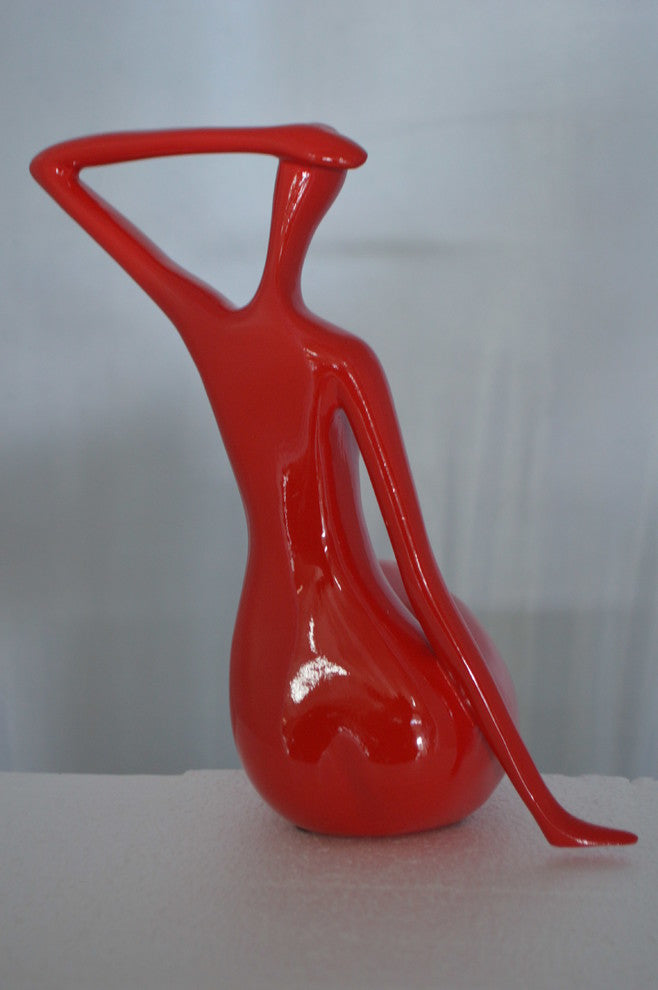 Modern Art Sitting on Edge Girl Made of Resin -  Size: 9"L x 7"W x 16"H.