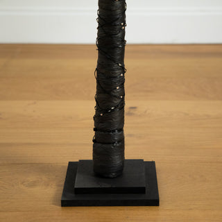 Trunk close-up on indoor floor, cropped view (lifestyle close).