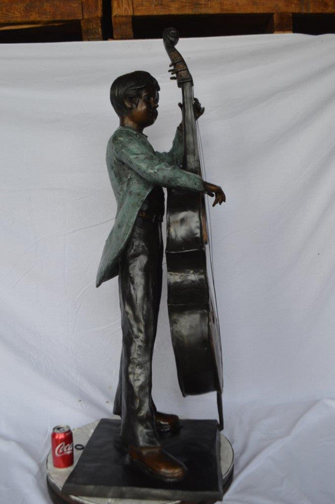 Boy playing cello large bronze statue -  Size: 19"L x 22"W x 59"H.