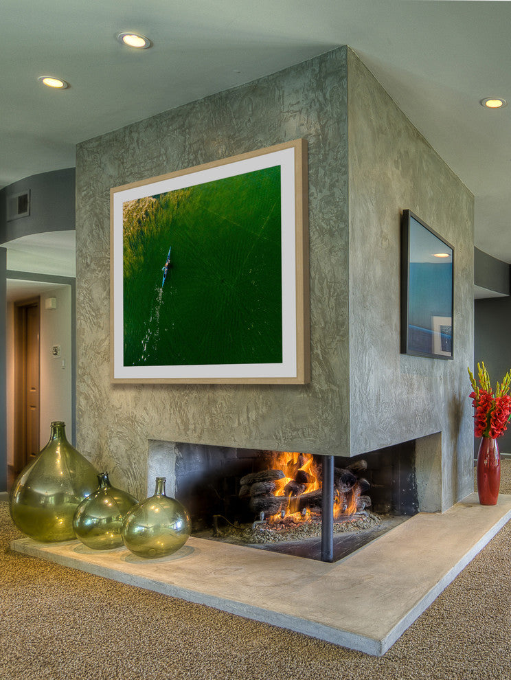 "Blue Canoe" Framed Print by Karolis Janulis