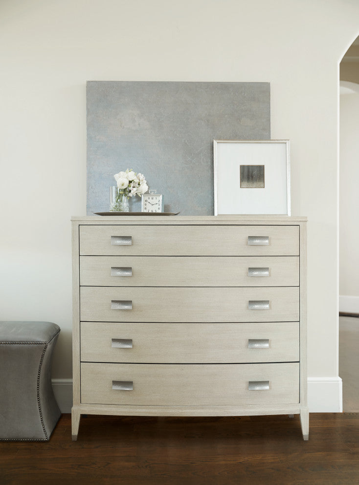 Lifestyle image showing chest in a real room with decor; product in context.