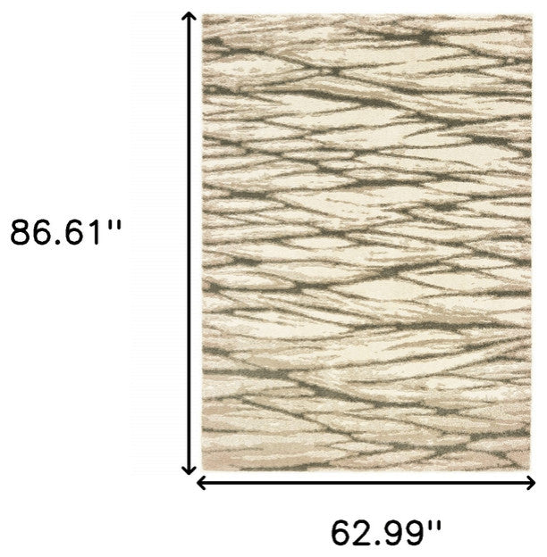 5' X 7' Ivory Sand And Ash Abstract Power Loom Stain Resistant Area Rug