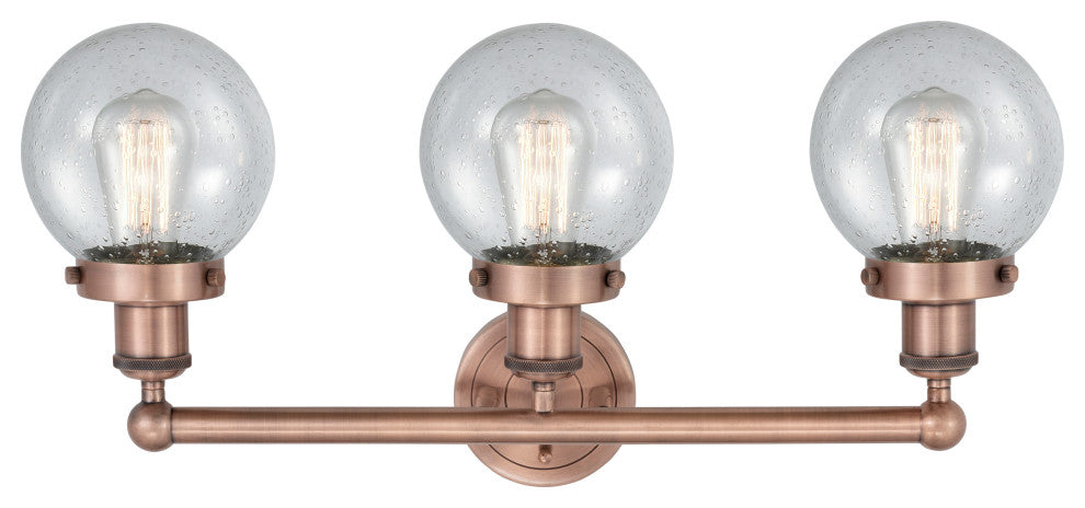Small Edison Beacon 3-Light 25" Vanity Light, Antique Copper Finish, Seedy Shade