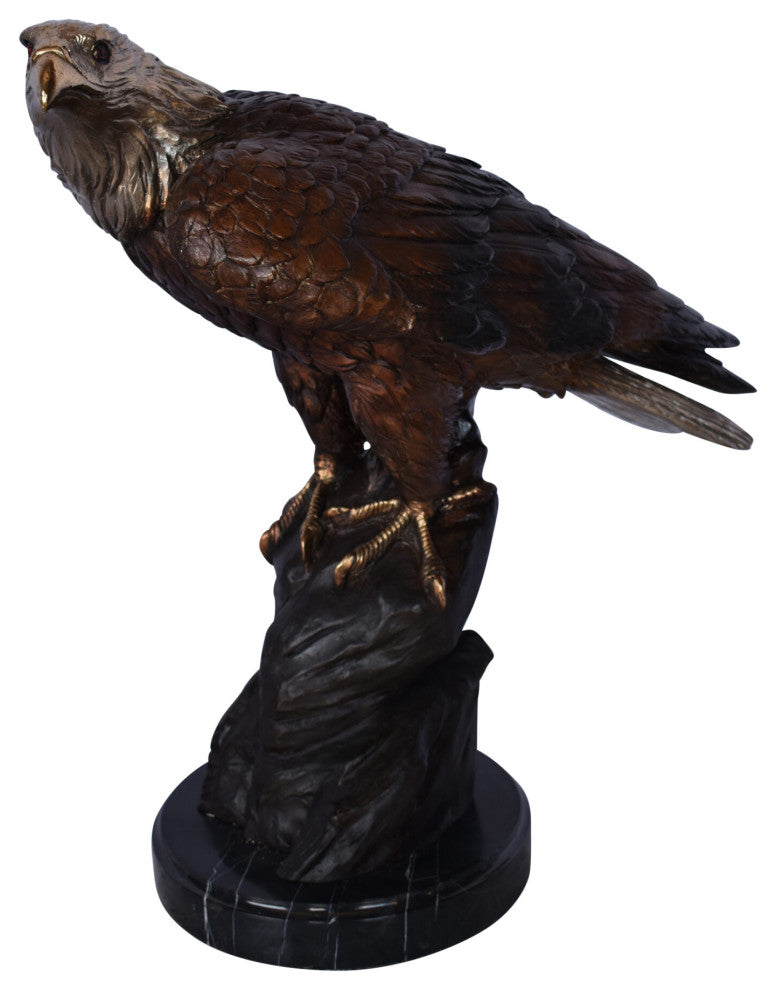 Eagle on Rock Bronze Statue Mounted on Marble Base Size: 10"L x 22"W x 21"H.