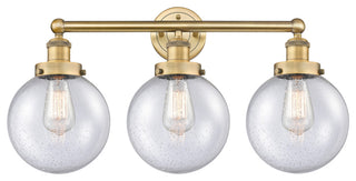 Edison Large Beacon 3-Light 25" Vanity Light, Brushed Brass Finish, Seedy Shade
