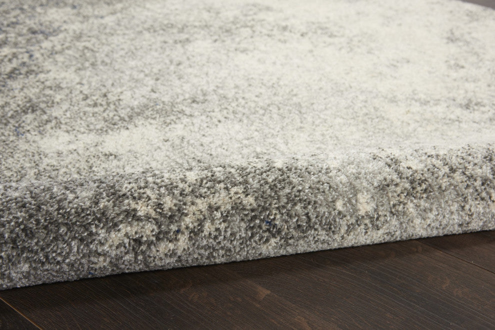 8 Round Charcoal and Ivory Abstract Area Rug