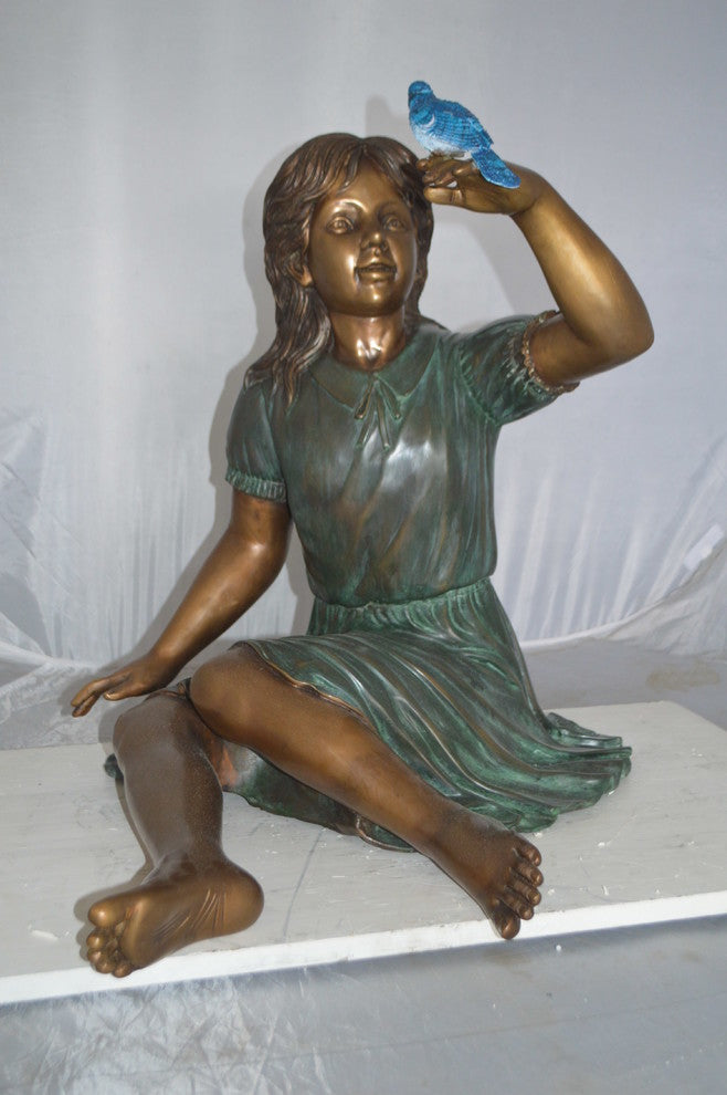 Girl with a Blue Sparrow Bronze Statue -  Size: 26"L x 31"W x 25"H.