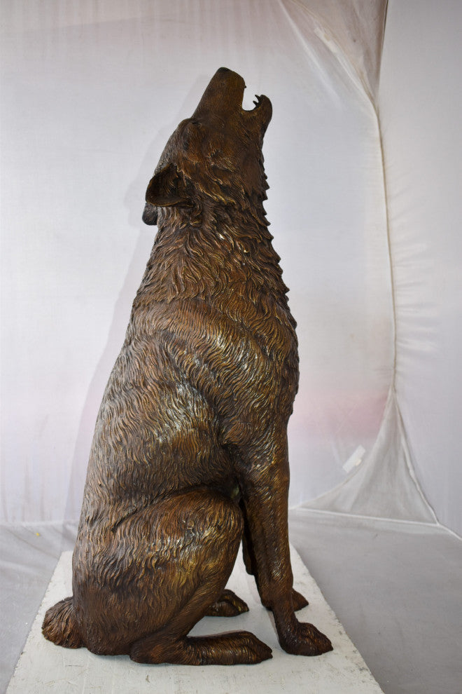 Howling Wolf looking toward the sky Bronze Statue Size: 19" x 19" x 36"H