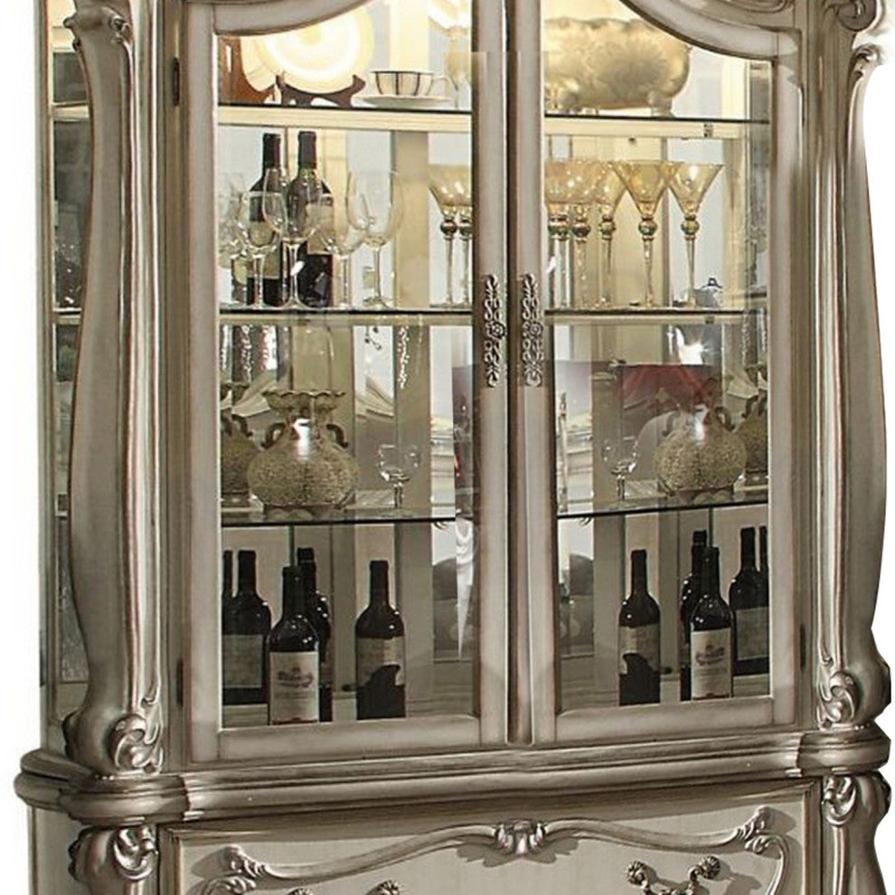 Benzara BM261794 Curio Cabinet With Scrolled Motifs and Touch Light, Off white