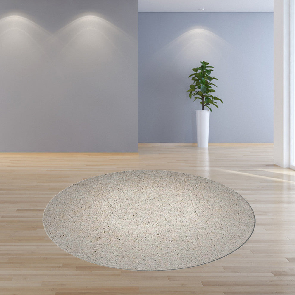 HomeRoots 8' Round Polyester Ivory Area Rug