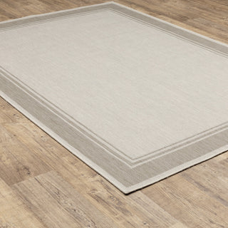 Parlan Solid Border Indoor-Outdoor Area Rug, Ivory, 5'3"x7'3"
