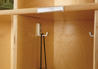 Close-up interior shot highlighting hooks/compartments; lifestyle setting.